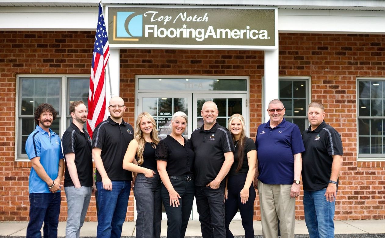 Top Notch Flooring America Team Photo in front of the store