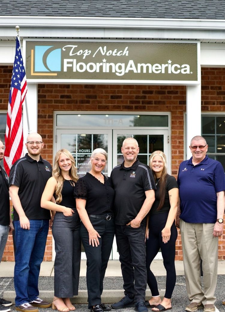 Top Notch Flooring America Team Photo in front of the store