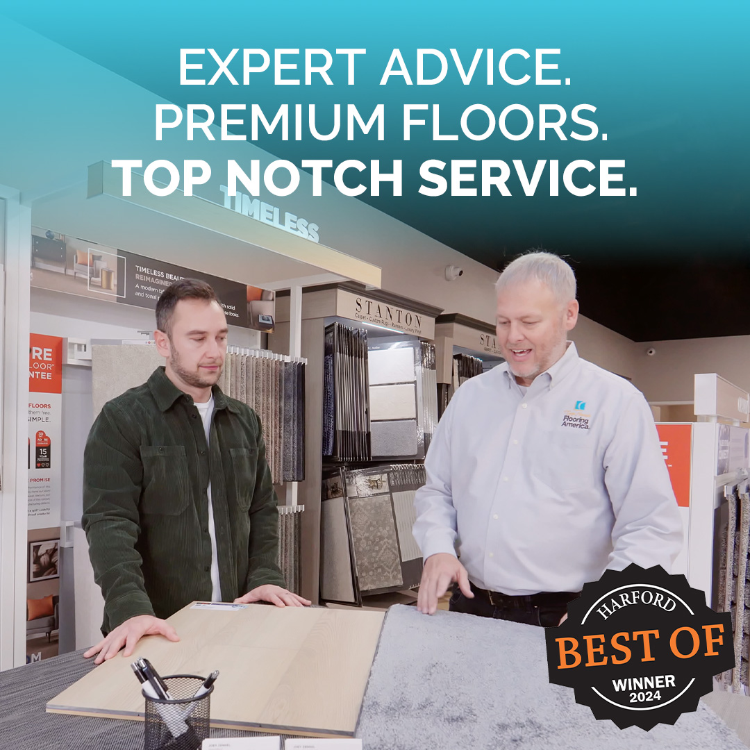 Flooring expert showing flooring samples